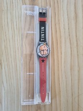 montre swatch quartz tintin neuve dans sa boîte jamais portée