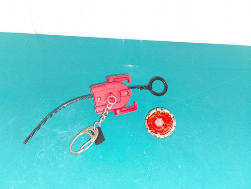 1904264 porte clef toupie