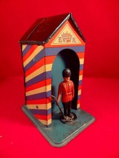 Vintage tin toy money box royal guard guardhouse Wells ? England 1950s