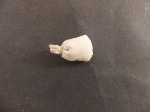 Figurine quiralu ferme sac - 1,