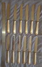 12 couteaux de table Métal