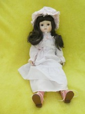 Poupée brune en porcelaine ( marque anglaise : ALBERON DOLL )