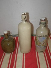 Poterie: 3 anciennes bouteilles en grès, 25, 75 et 100cl