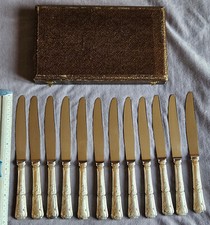 12 couteaux de table à