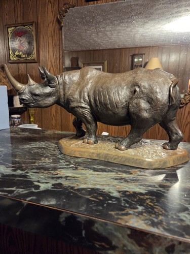 Defective rhinoceros sculpture - defective,