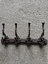 Ancien porte manteau en fonte décoré sculpté