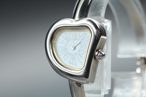 Comme neuf montre à - neuf],