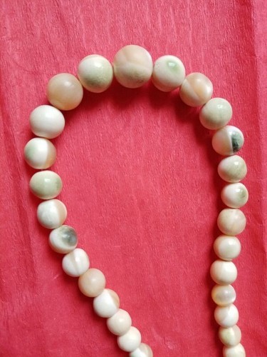 Collier avec perles en - un,