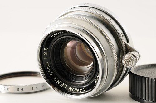 Near mint canon objectif - near,