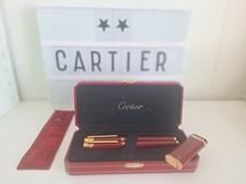 Must de cartier, stylo à plume plume  en or 18 cts, et roller   briquet bordeaux