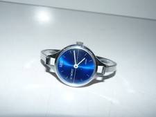 ancienne montre femme mécanique / st tropez swiss / testé ok / diamètre 3cm