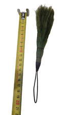 Plumet en crin de couleur verte, à identifier.