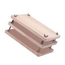 Presse à reliure, outil de