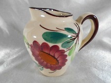 TRES BEAU PICHET A VIN / EAU DECOR FLORAL EN FAIENCE A IDENTIFIER