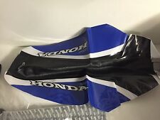 UNE HOUSSE DE SELLE SIEGE NEUVE NOIR BLEU BLANC POUR MOTO ENDURO HONDA