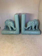 PAIRE DE SERRE LIVRE ELEPHANT CRAQUELEE