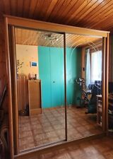 Armoire en chêne avec 2 portes miroir. H 219. L 194. P 62. Très bon état.