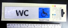 Panneau "WC(handicap)" - Plexiglas - Marque NOVAP cat. #160531300 - 170 x 45 mm
