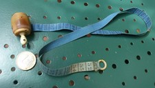 Ravissant petit mètre de couturière XIXème, matière noble, image d'une sainte