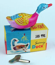 jouet en tôle - canard avec remontoir à clé