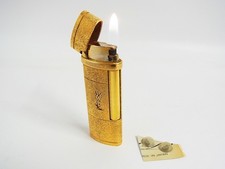 Briquet à gaz Yves Saint Laurent logo YSL doré fonctionnel avec silex 2p