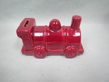 Ancienne tirelire à casser en