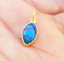 Breloque en or massif 18