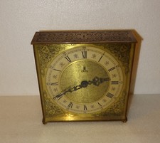 ANCIENNE PENDULE VINTAGE EN LAITON. MECANISME A RESSORTS. 