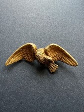 Victorian 14K gold eagle brooch with ruby eyes