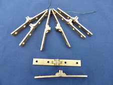 2 compas sur  plat charnières