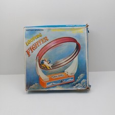 Jouet ancien d'avion en boucle battery operated looping fighter + boite