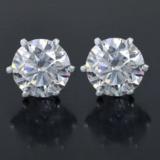 Clous solitaire diamant blanc