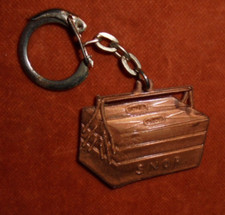 Porte-clés Keychain plastique BOITE à Outils SNOR S.N.O.R. Groupe MANUTAN