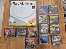 Lot Playstation en boite + 12 jeux + notice neuve + SCPH 5502 / 1002 Pal Fr / Eu