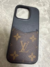 Coque LOUIS VUITTON Bumper Pallas iPhone 16 Pro monogramme noir x marron du J...