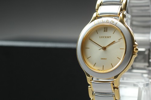Montre homme ronde - , bicolore