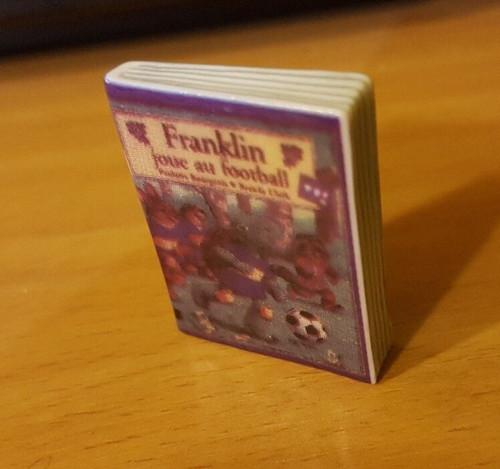 Fève livre franklin joue - -,