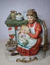 Statuette figurine En Porcelaine Femme est sont Enfant Devant La Cheminée