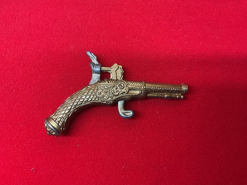 Jouet vintage mini - pistolet, en