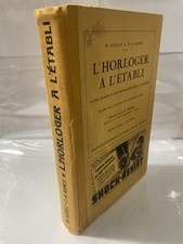L’Horloger à l’établi