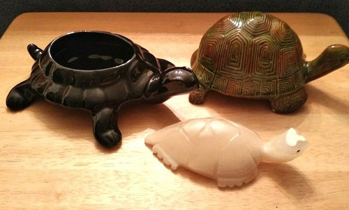 Three turtle figurines two - turtle,