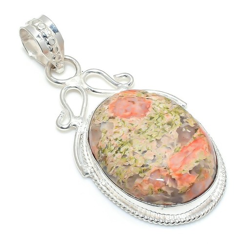 Pendentif bijou ancien fait