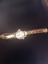 Montre  femme à Remontoir , plaquée or 18 K, Fonctionne