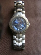 Montre homme "Festina" avec bracelet métal (dates et heures) mécanisme quartz 