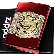 Briquet Zippo King Dragon sculpture or rouge dragon élégant d'occasion