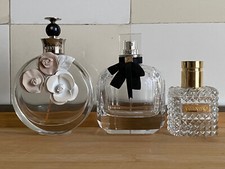 3 flacons vides eau de toilette YSL et Valentino