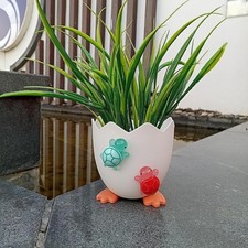 Pot de fleur en forme d'oeuf avec décoration de tortue ornement de Pâques