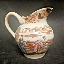 Joli petit pot à lait à