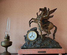 sculpture horloge de cheminee