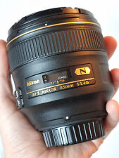 Nikon AF-S Nikkor 85mm f/1.4G with pouch and covers boxed in mint condition